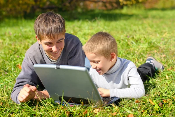 stock image Brothers with notebook