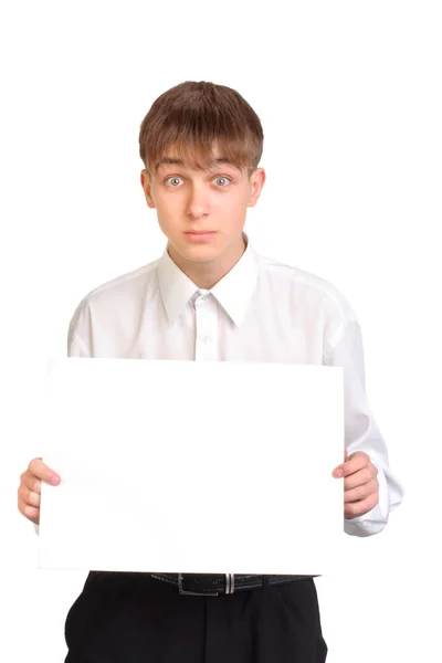 Teenager holding blank paper — Stock Photo, Image