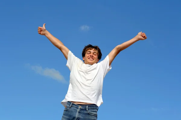 Happy teenager jumping — Stock Photo, Image