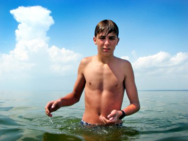 Teenager in the sea clipart