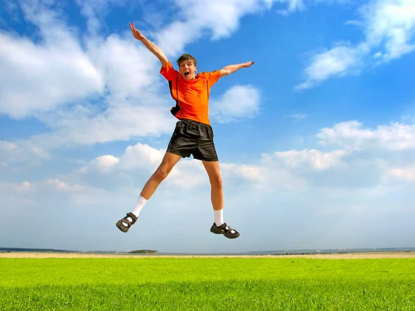 Happy teenager jumping — Stock Photo, Image