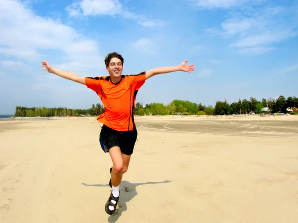 Happy teenager running — Stock Photo, Image