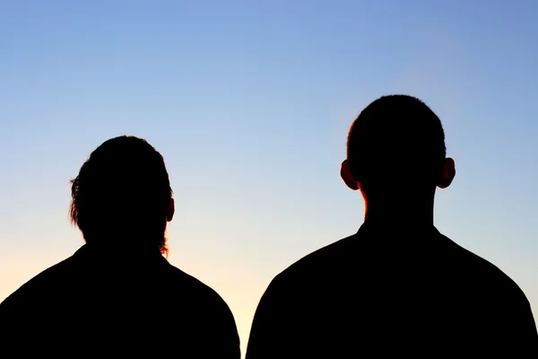 Due amici silhouette — Foto Stock