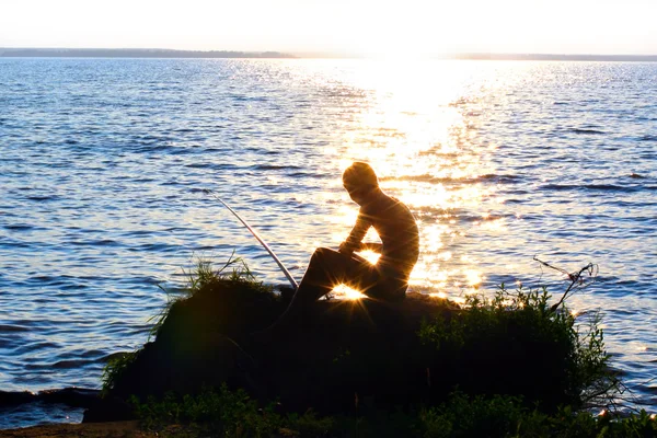 Fiskare på en solnedgång — 图库照片