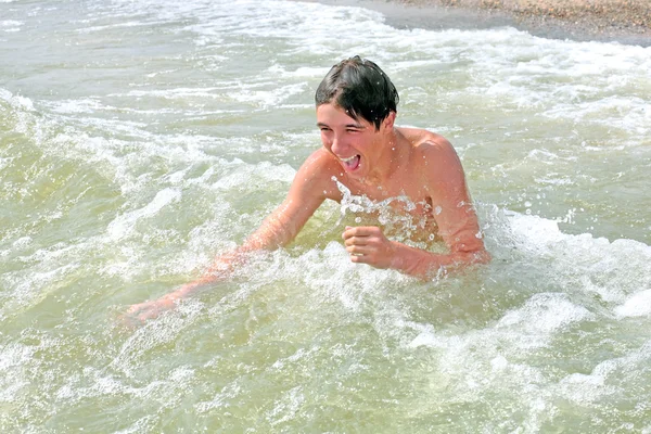 Teenager in the sea Royalty Free Stock Images