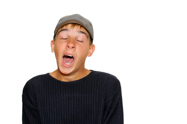 Зевающий мальчик — стоковое фото