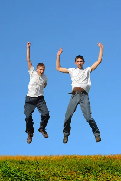 Boys jumping Stock Photo