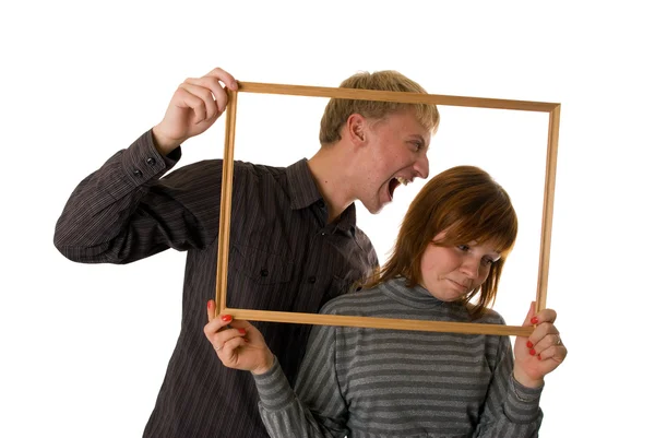 Junges Paar posiert und spielt Tricks — Stockfoto
