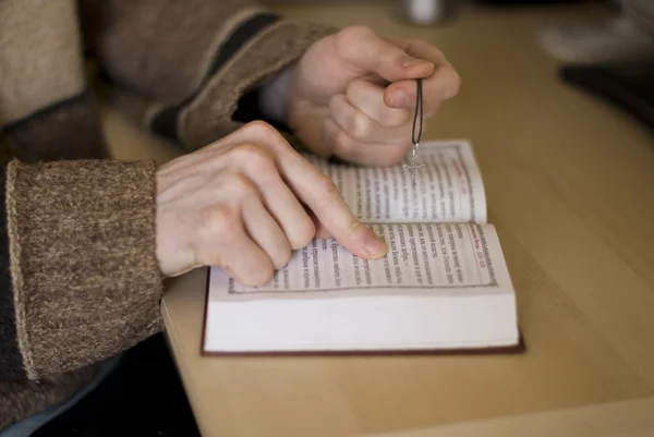 stock image Hands on the Holy Bible