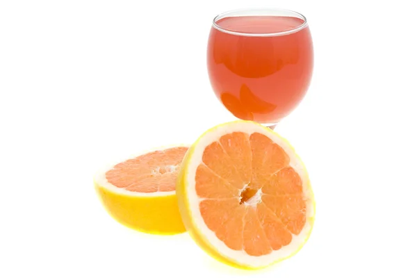 Grapefruitsaft und Früchte — Stockfoto