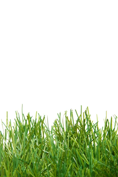 Zelené svěží umělá tráva — Stockfoto