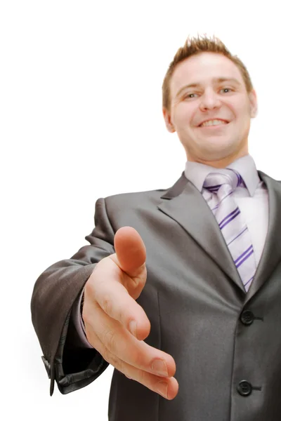 Um homem de negócios apertando as mãos — Fotografia de Stock