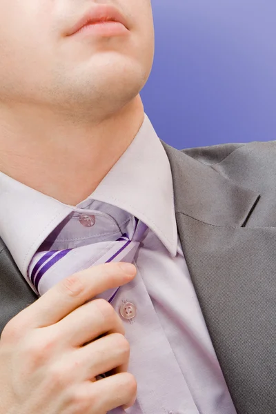 Man untying a necktie — Stock Photo, Image