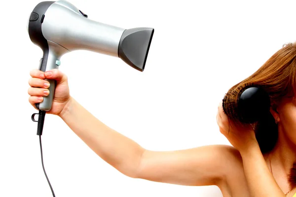 Feminino mão segurando secador de cabelo — Fotografia de Stock