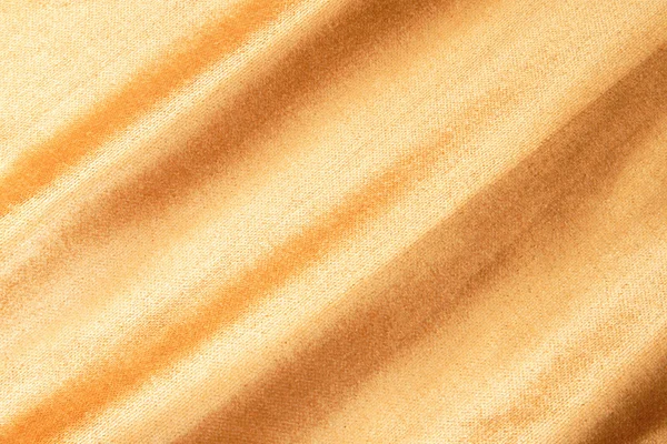 Zlatá texturou tkaniny — Stock fotografie