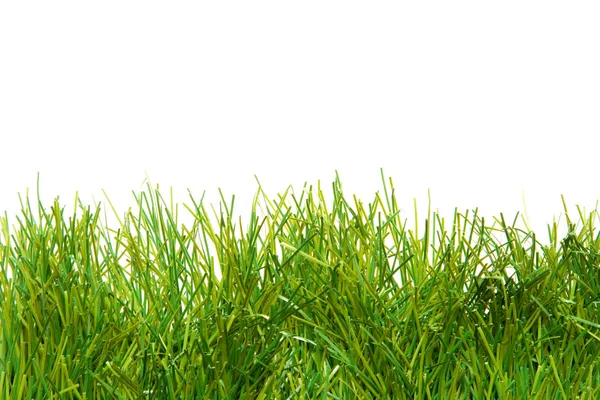 Зелена пишна штучна трава Стокове Зображення