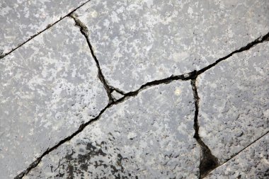 Cracked granite after rain clipart