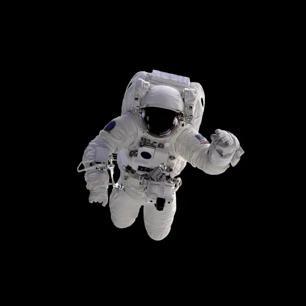 Latający astronauta na czarnym tle. — Zdjęcie stockowe