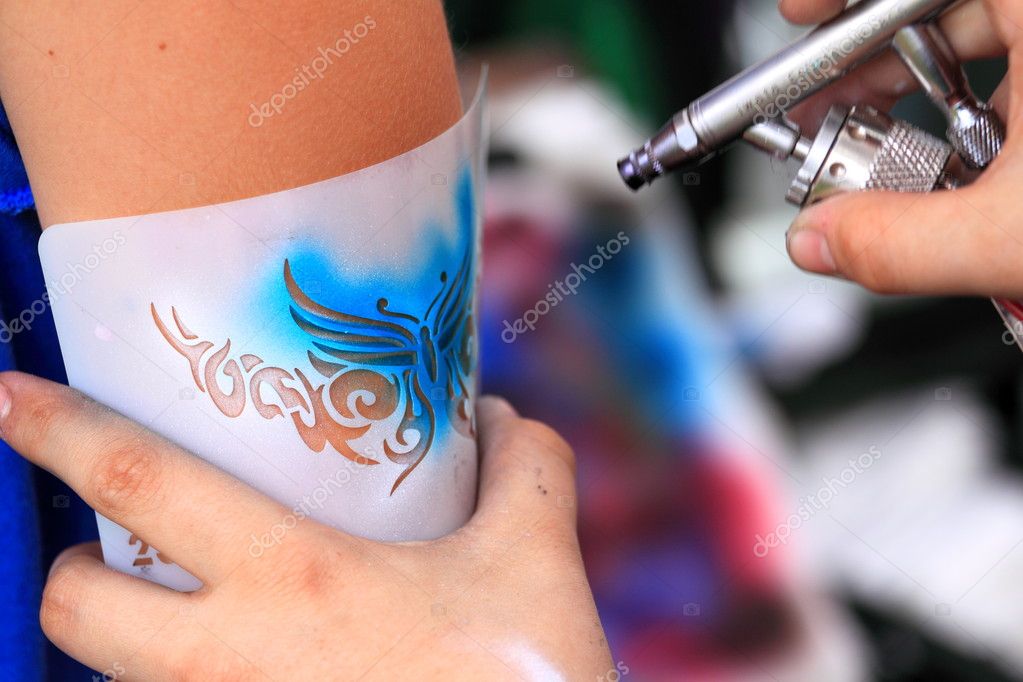 Air brush tatoo Stock Photo by ©hlehnerer 2532723