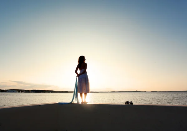 stock image Girl watch sunset