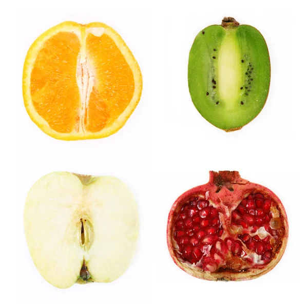 Cuatro frutas cortadas a la mitad —  Fotos de Stock