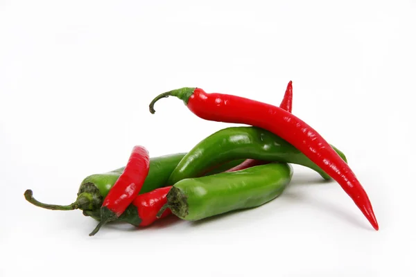 Red and green peppers — Stock Photo, Image