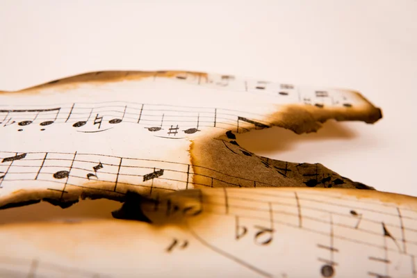 Burnt musical notebook — Stock Photo, Image