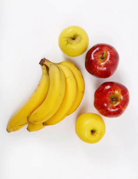 Cuatro manzanas y plátanos —  Fotos de Stock