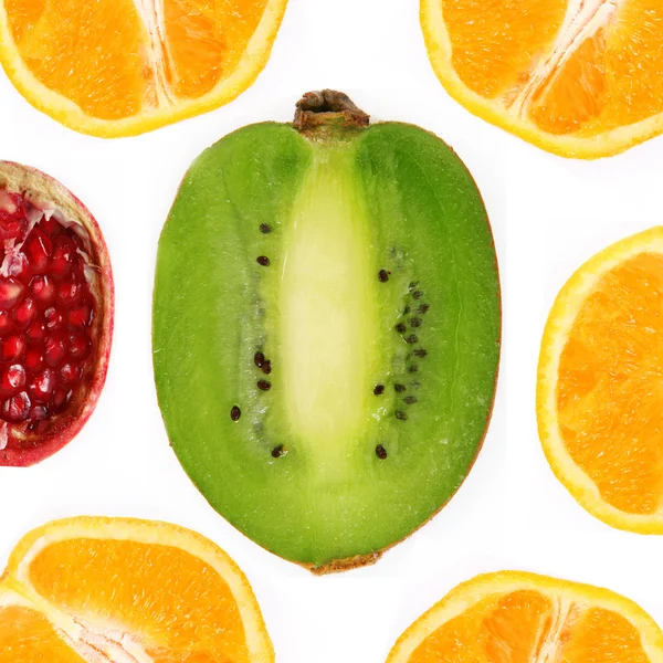 Collage of fruit cut in half Royalty Free Stock Images