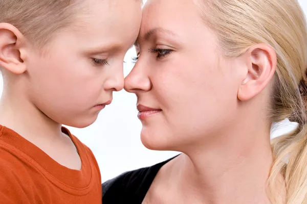 Close-up portrait of mother and son — Stock Photo, Image