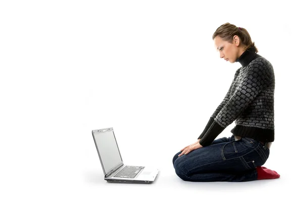 Woman sitting on white background with a — Stock Photo, Image
