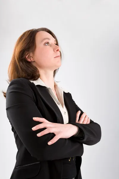 Business woman looking upwards — Stock Photo, Image
