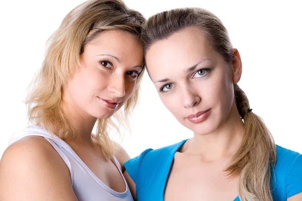 Zwei junge Frauen, über weiß — Stockfoto