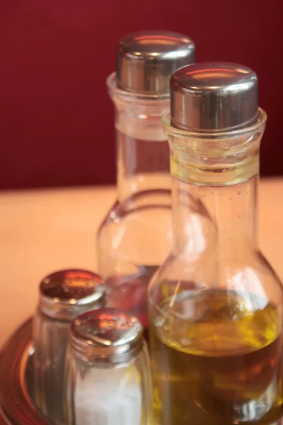 stock image Oil, salt and pepper bottle on the table