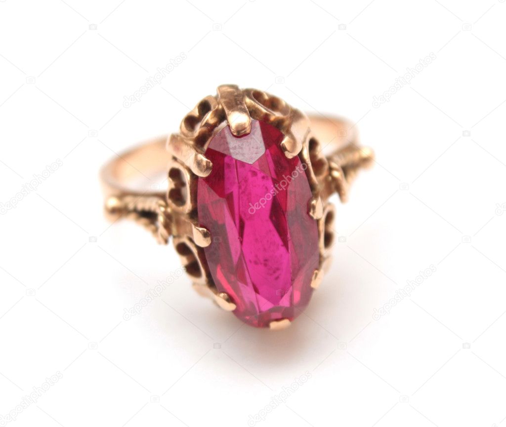 Golden ring with pink sapphire