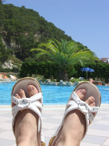 Feet with near the pool
