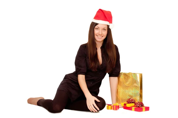 Weihnachtsmädchen mit Geschenken — Stockfoto