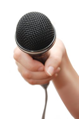 Hand holding a microphone clipart