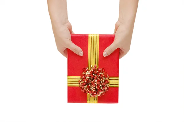 Caixa com um presente em uma mão — Fotografia de Stock