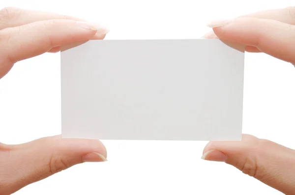 Cartão de papel em mãos de mulher — Fotografia de Stock