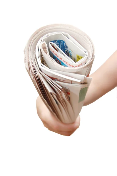 Mão segurando um jornal — Fotografia de Stock