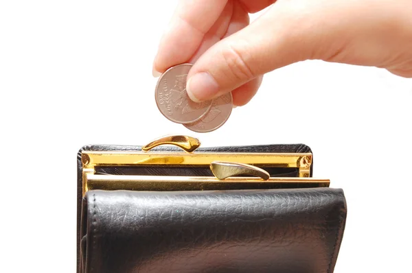 Black wallet and coin in hand — Stock Photo, Image