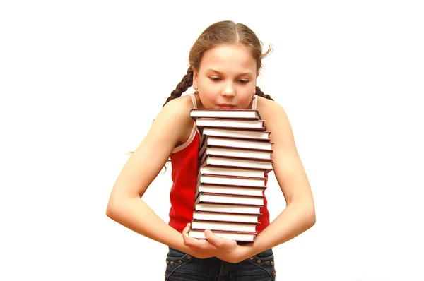 Adolescente com pilha de livros — Fotografia de Stock