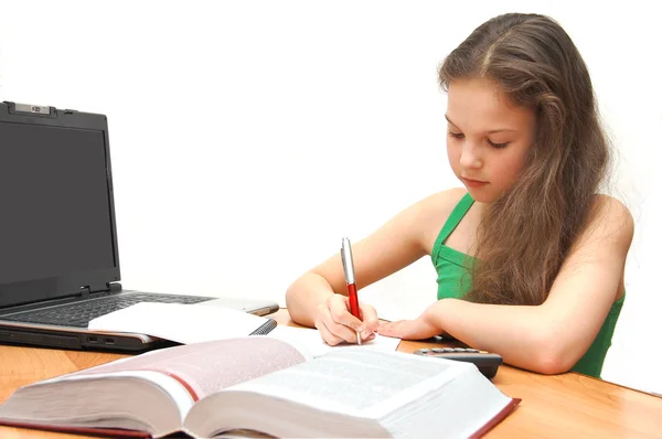 Girl the teenager learns lessons — Stock Photo, Image