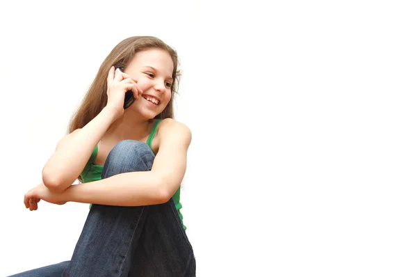 Girl the teenager speaks on the phone — Stock Photo, Image