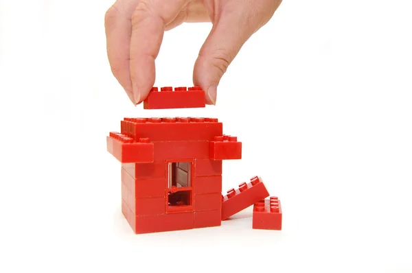 Petite maison de blocs de jouets rouges — Photo