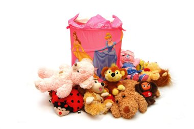 Different toys laying about a box clipart