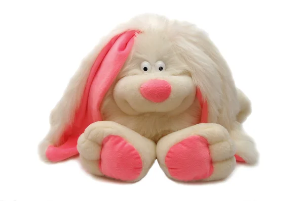 Leksak - en vit kanin med rosa öron — Stockfoto