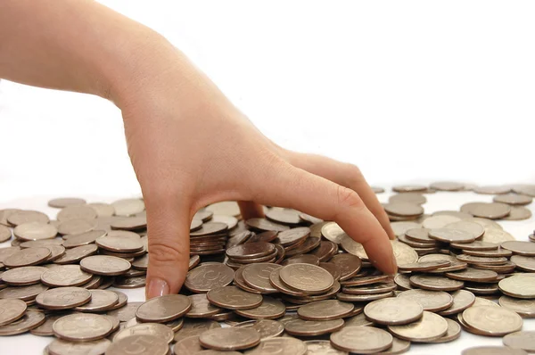 The female hand takes coins — Stock Photo, Image