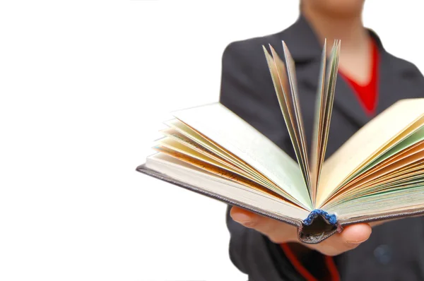 Ruka drží otevřená kniha — Stock fotografie